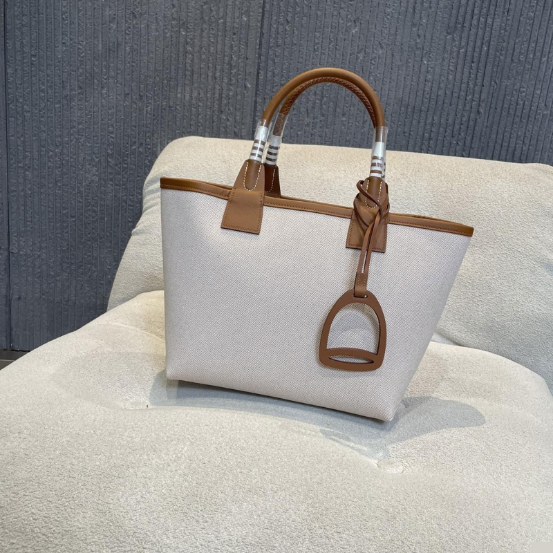 H**mes shopping bags